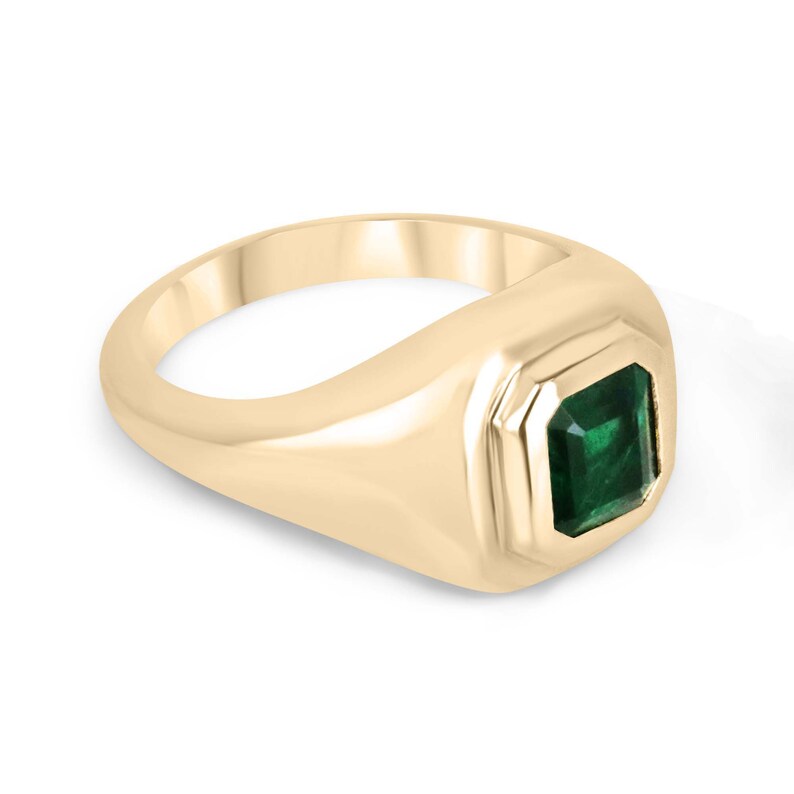 Unisex 18K gold ring featuring a 1.48 carat intense dark green Asscher cut emerald in a double bezel setting by Colombian Emerald.