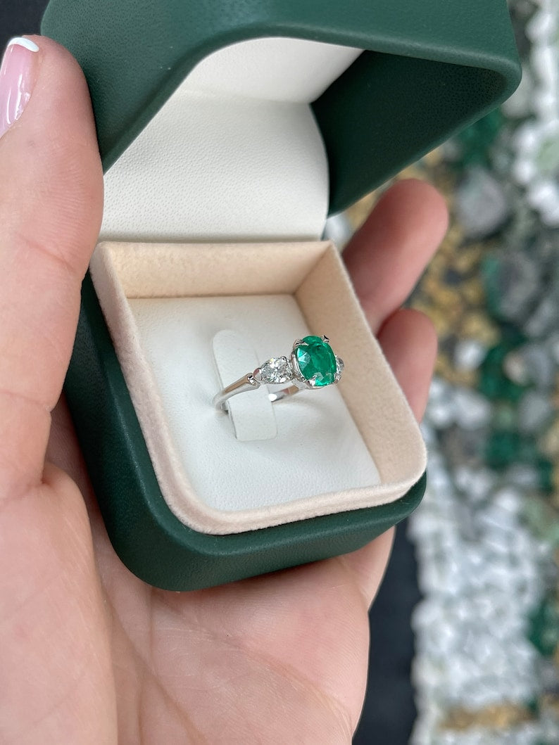 Colombian Emerald 2.18tcw vivid dark green three-stone engagement ring with diamond accents, fine quality ring showcasing emerald and diamonds.