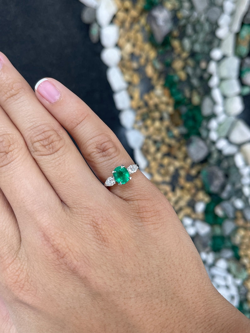Colombian Emerald three-stone engagement ring with vivid dark green emeralds and diamond accents, fine quality jewelry.