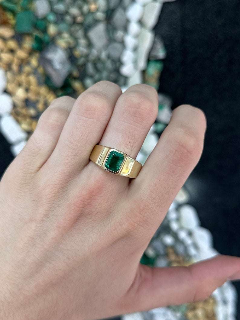 14K Colombian Emerald men's gold ring with a 2.65ct lush dark green emerald cut gemstone set north to south.