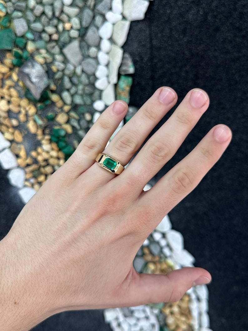 Colombian Emerald AAA+ 2.70ct rich vivid green east-west emerald cut solitaire gypsy ring, detailed close-up image.