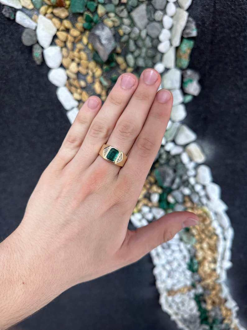 14K gold men's ring with a 2.73 carat dark green emerald cut emerald and diamond accents, Colombian Emerald brand.