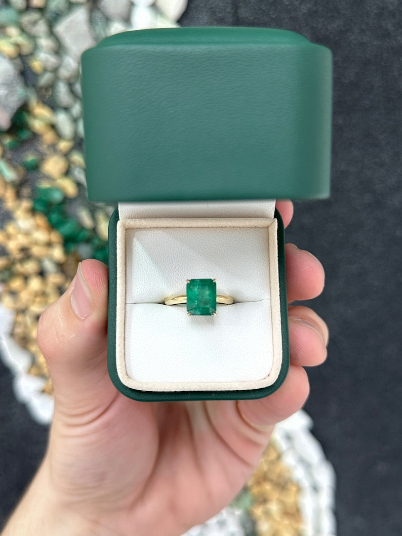 14K gold emerald cut solitaire engagement ring with rich green emerald, 4 prongs, Colombian Emerald brand, elegant ring design