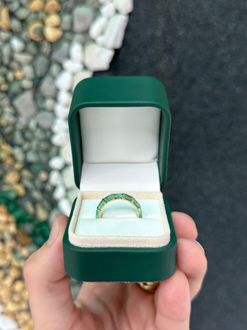 14K gold large emerald baguette wedding band ring with Colombian emeralds, size 7, showcasing elegant gemstone design.