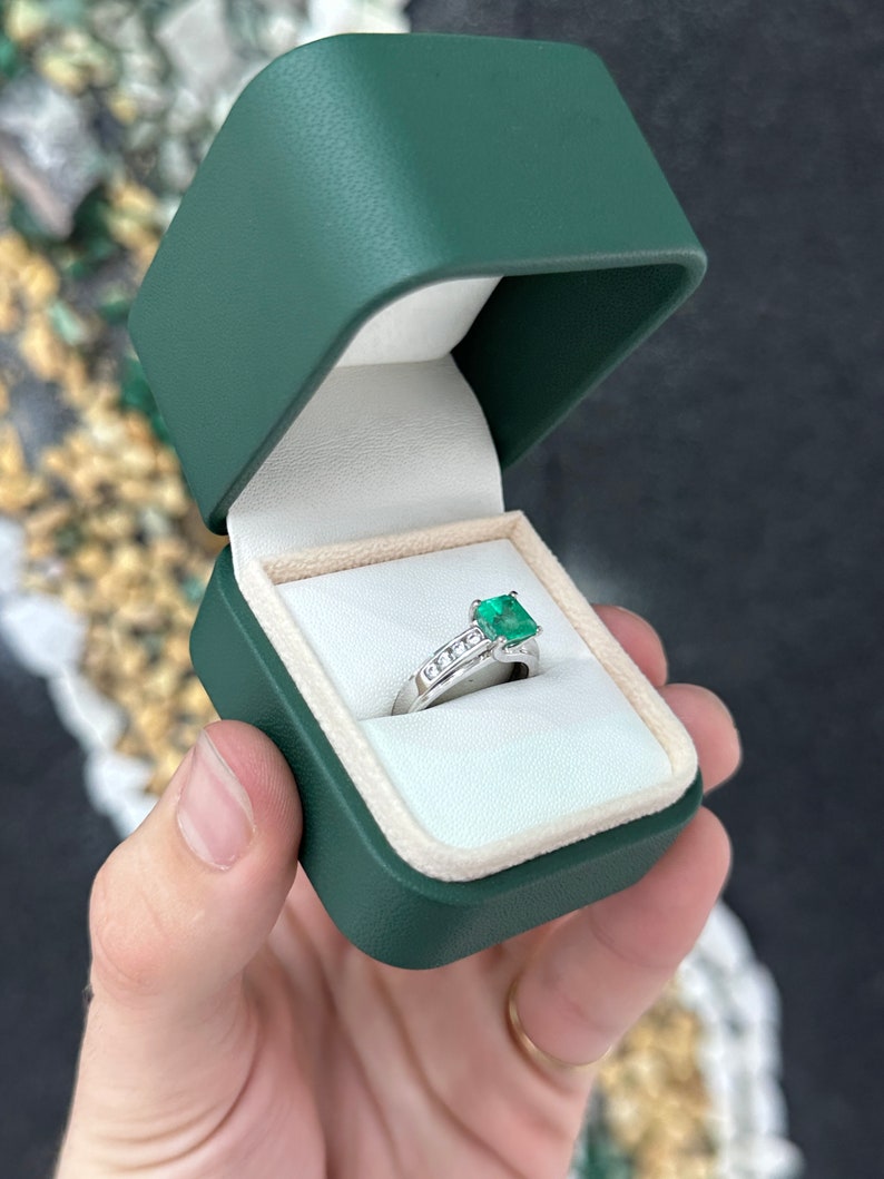 14K white gold emerald solitaire ring with diamond accents, featuring a vibrant earth-mined emerald, by Colombian Emerald.