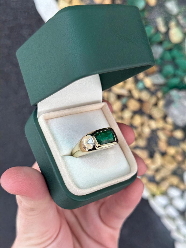 14K gold east-to-west emerald and diamond triangle ring with rich green emeralds and sparkling diamonds, Colombian Emerald jewelry.
