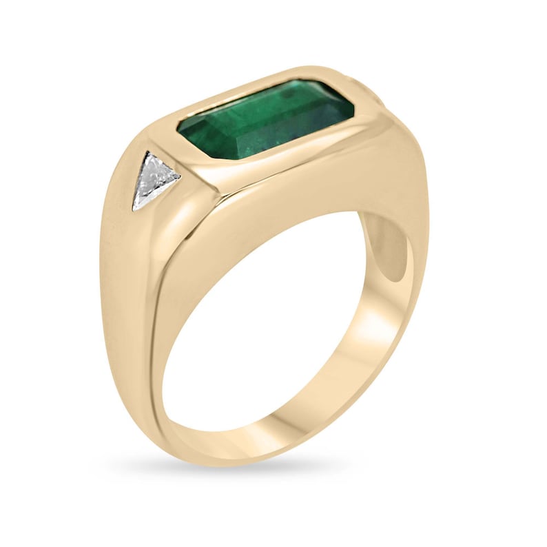 14K gold east-to-west emerald and diamond triangle ring featuring rich forest green emeralds and sparkling diamonds, Colombian Emerald brand.