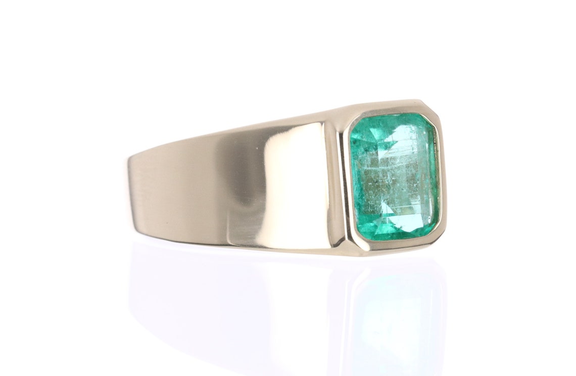 Men's sterling silver ring featuring a 2.80 carat Colombian emerald solitaire with a 14K bezel setting by JR Colombian Emeralds.