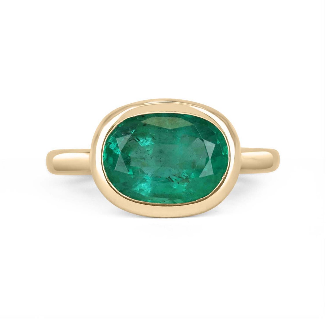 14K gold oval emerald solitaire ring with east-west setting by JR Colombian Emeralds, featuring a rich green 2.68 carat gemstone.
