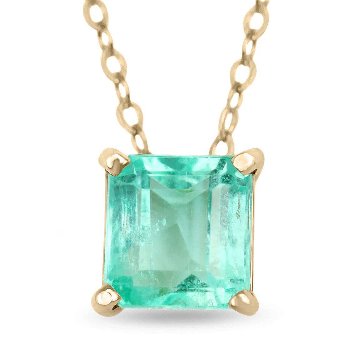 1.35 carat solitaire Colombian emerald pendant necklace in 14K yellow gold with four-prong setting