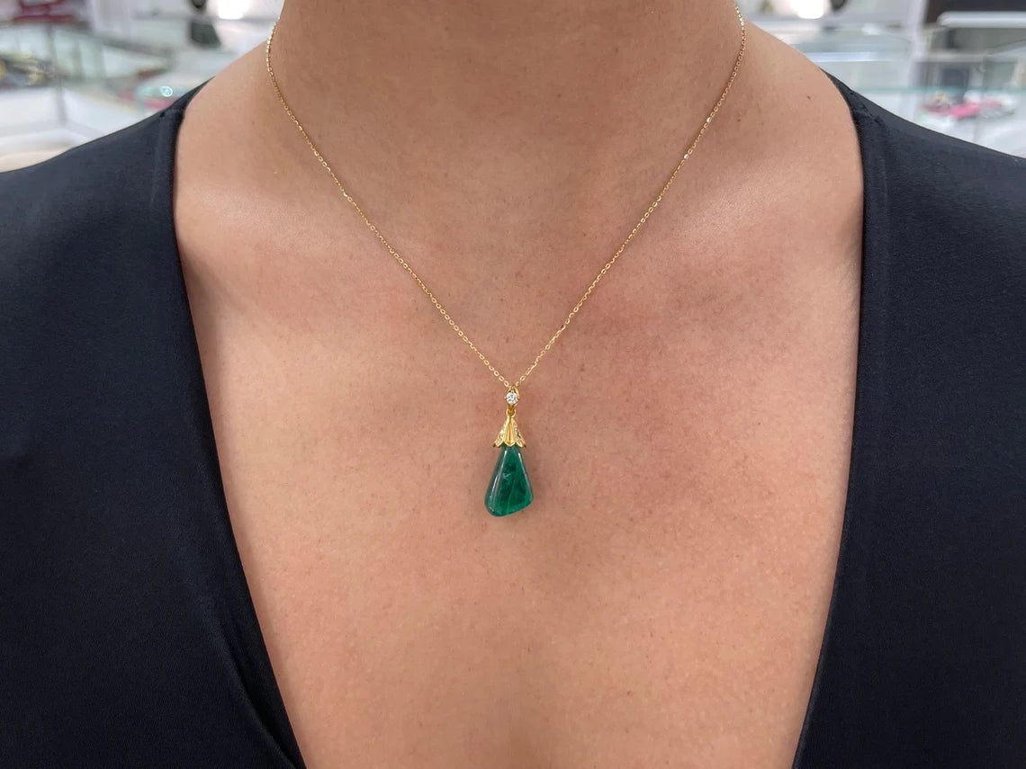 13.50 carat natural Colombian emerald baroque pendant with diamond accent
