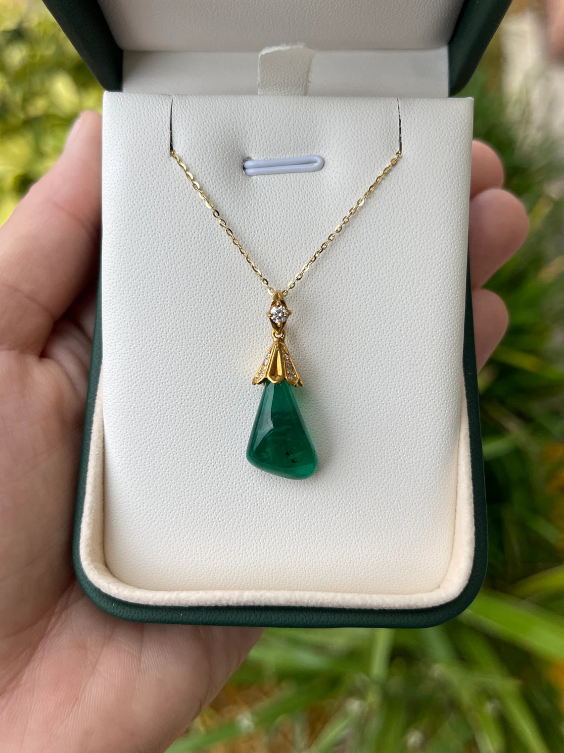 13.50 carat natural Colombian emerald baroque pendant with diamond accent