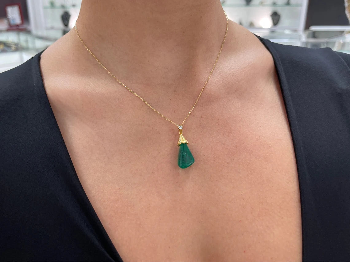 13.50 carat natural Colombian emerald baroque pendant with diamond accent