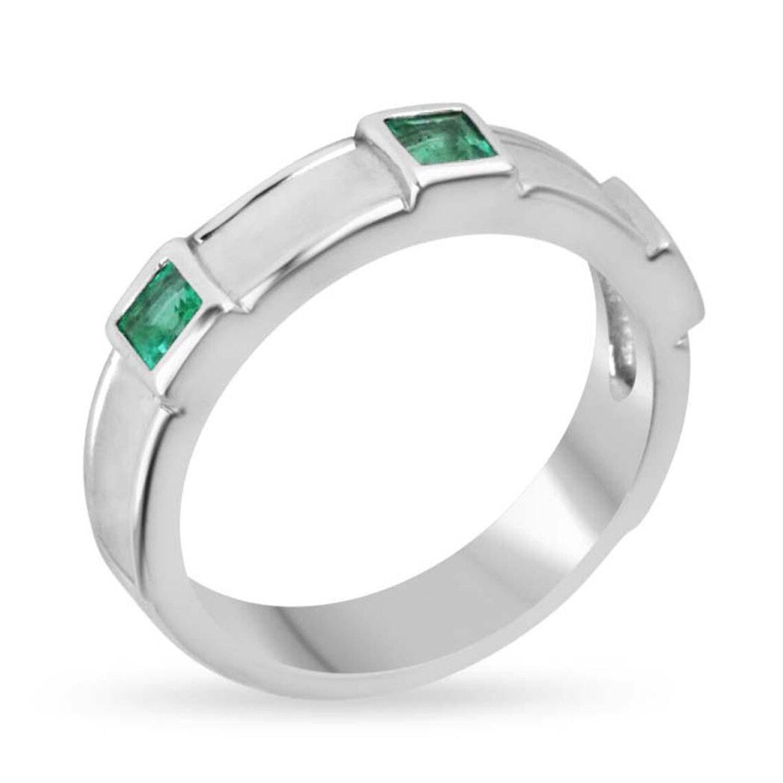 Men's 14K bezeled emerald three-stone band ring with rich green color, featuring a 0.30 carat total weight from JR Colombian Emeralds.