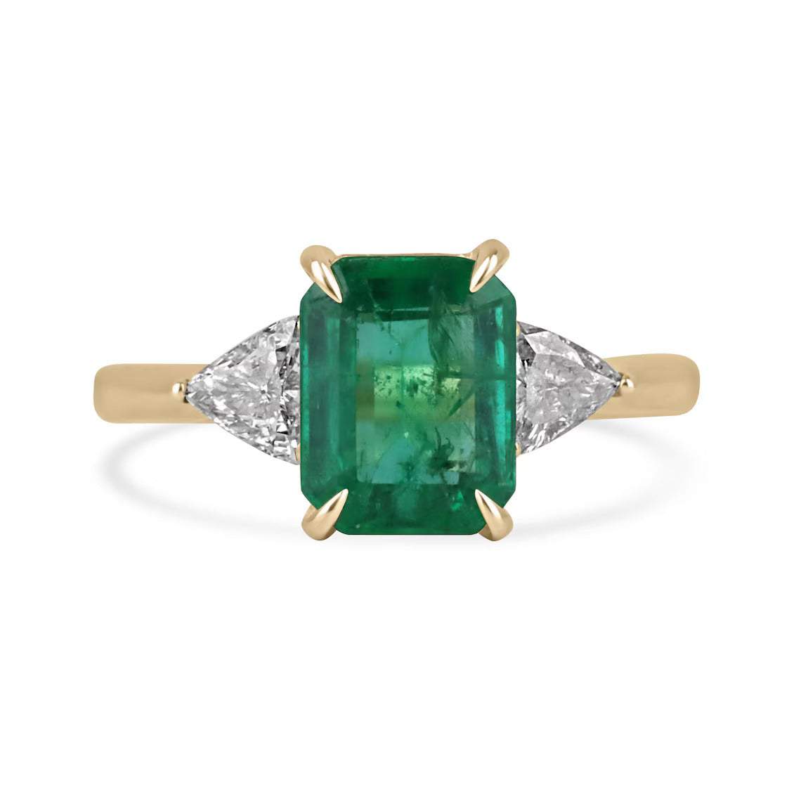 2.37 carat emerald cut emerald engagement ring with trillion diamond side stones in 18K yellow gold