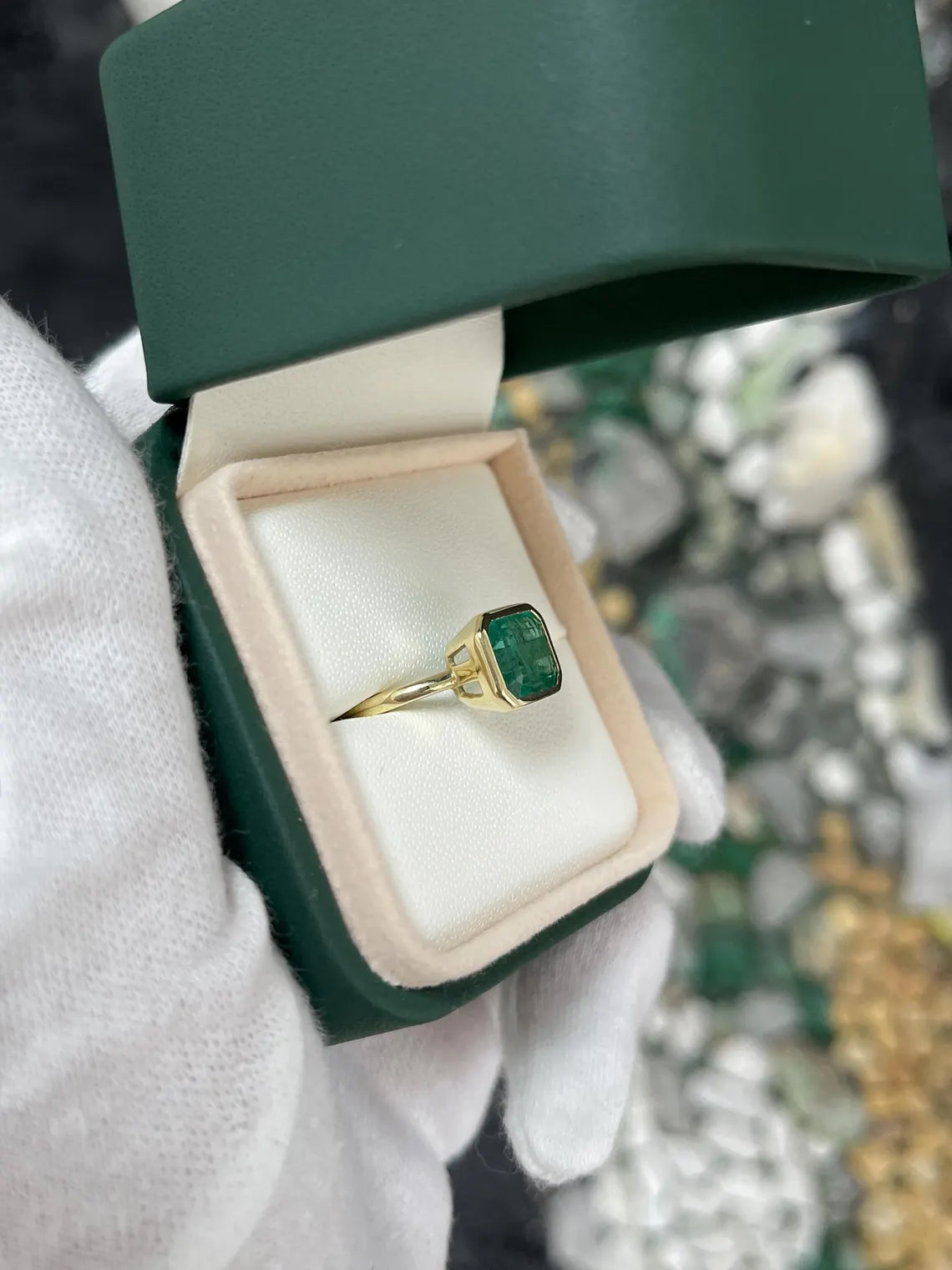 3.26ct Emerald Cut Solitaire Ring Features Lush Green Bezel Set Emerald