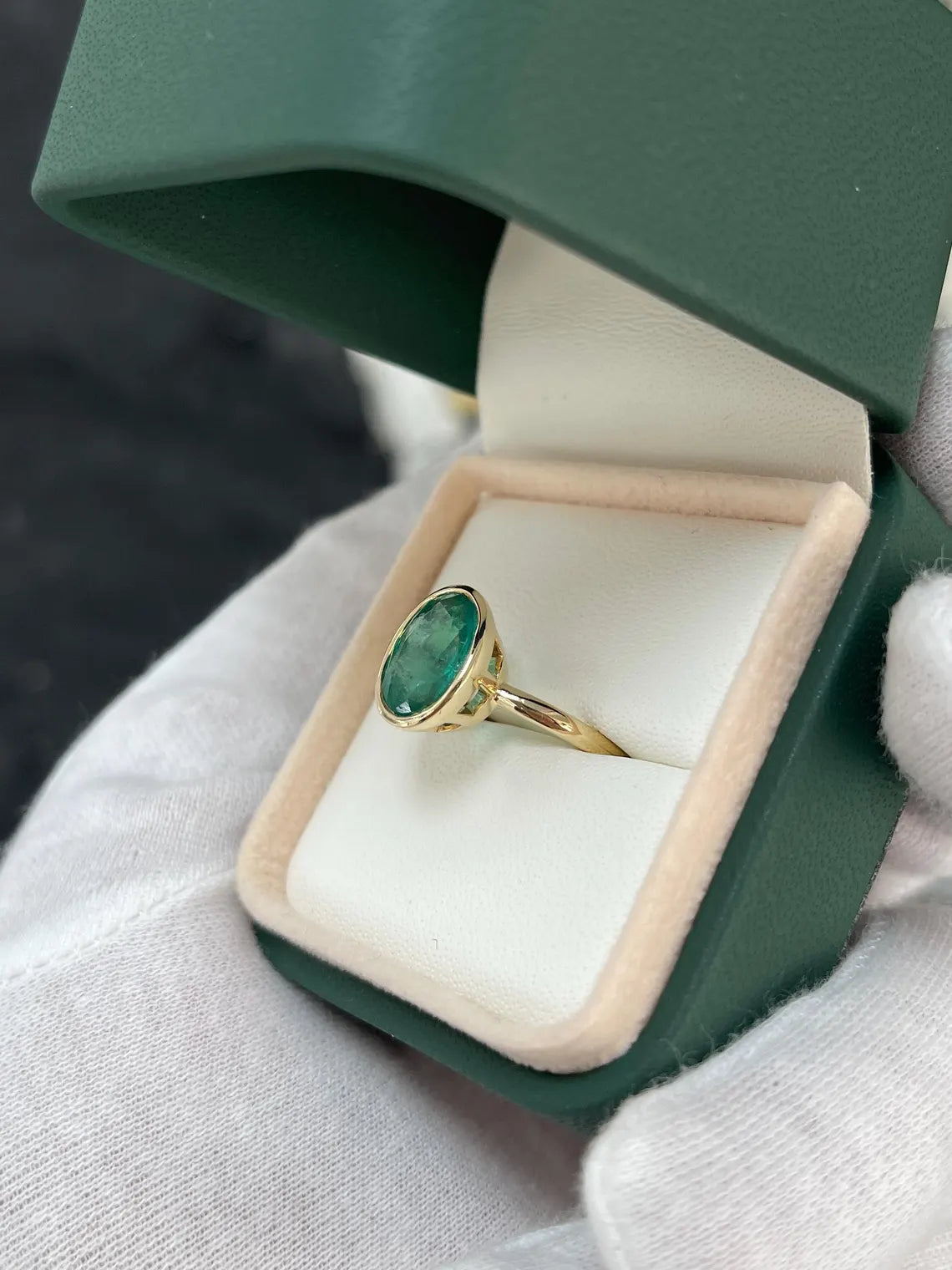 3.21ct Dark Green Oval Emerald Creates a Striking Solitaire Statement Ring