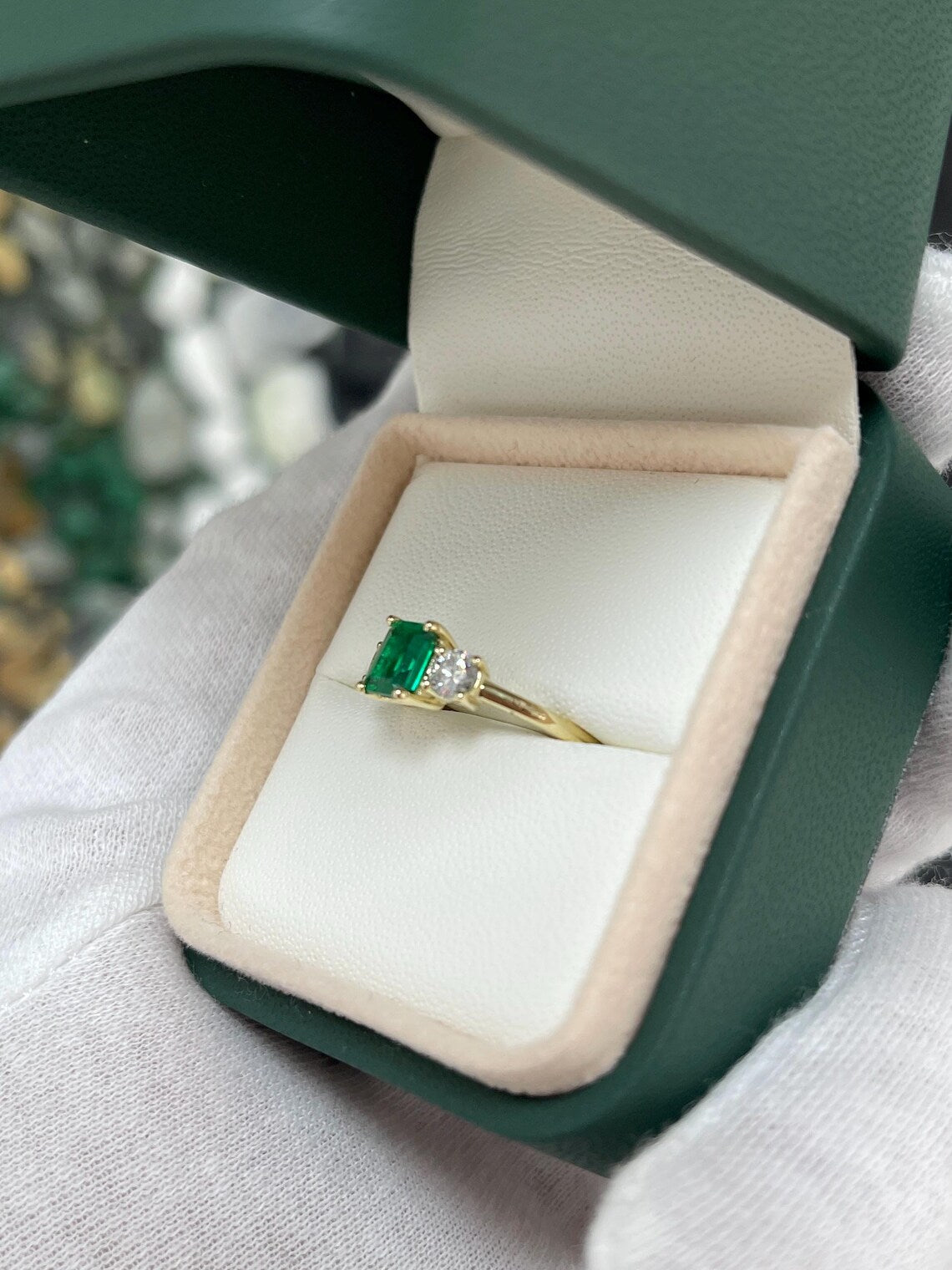 1.34ct Features Vivid Emerald Cut Emerald with Round Diamond Accents