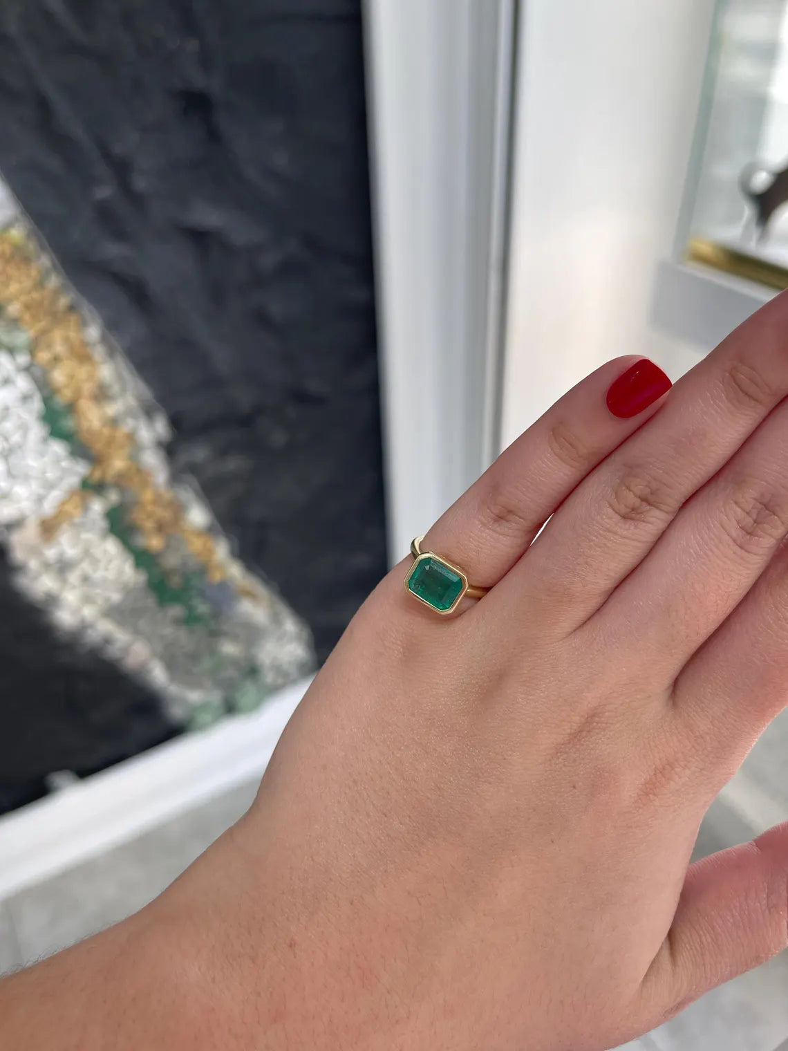 3.26ct Emerald Cut Solitaire Ring Features Lush Green Bezel Set Emerald