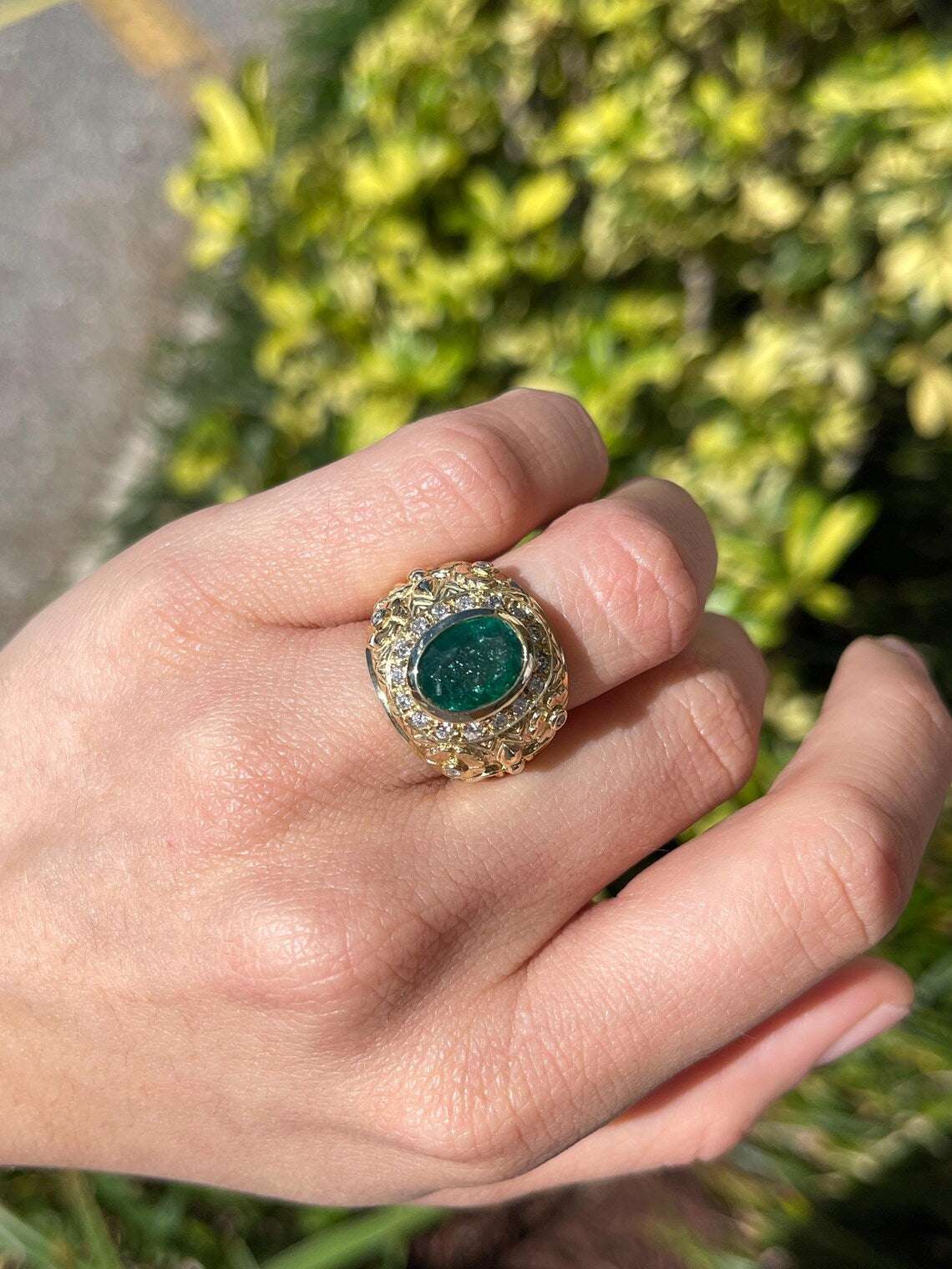 3.23ct Floral Oval Emerald Features Diamond Halo in Bold Statement Ring