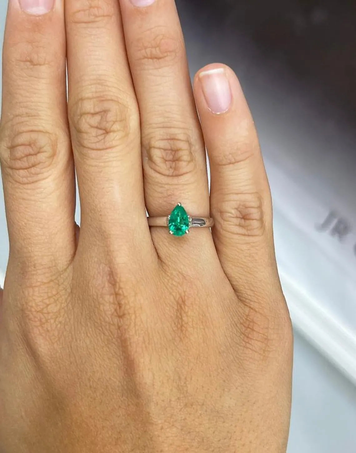1.15Tcw Pear Emerald Sparkles With Sapphire Diamond Accents Ring