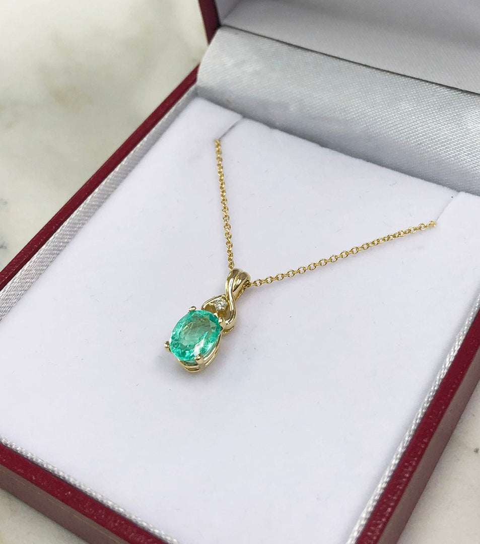 1.43tcw Natural Rich Green Emerald Oval Accented Round Diamond Pendant 14K