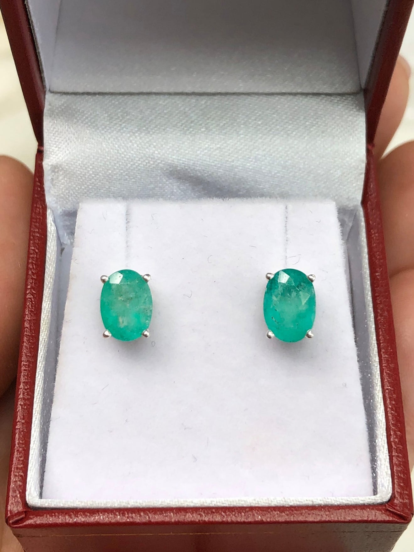 2.28tcw Colombian Emerald Oval Cut Natural May Birthstone Four Prong Silver Earrings