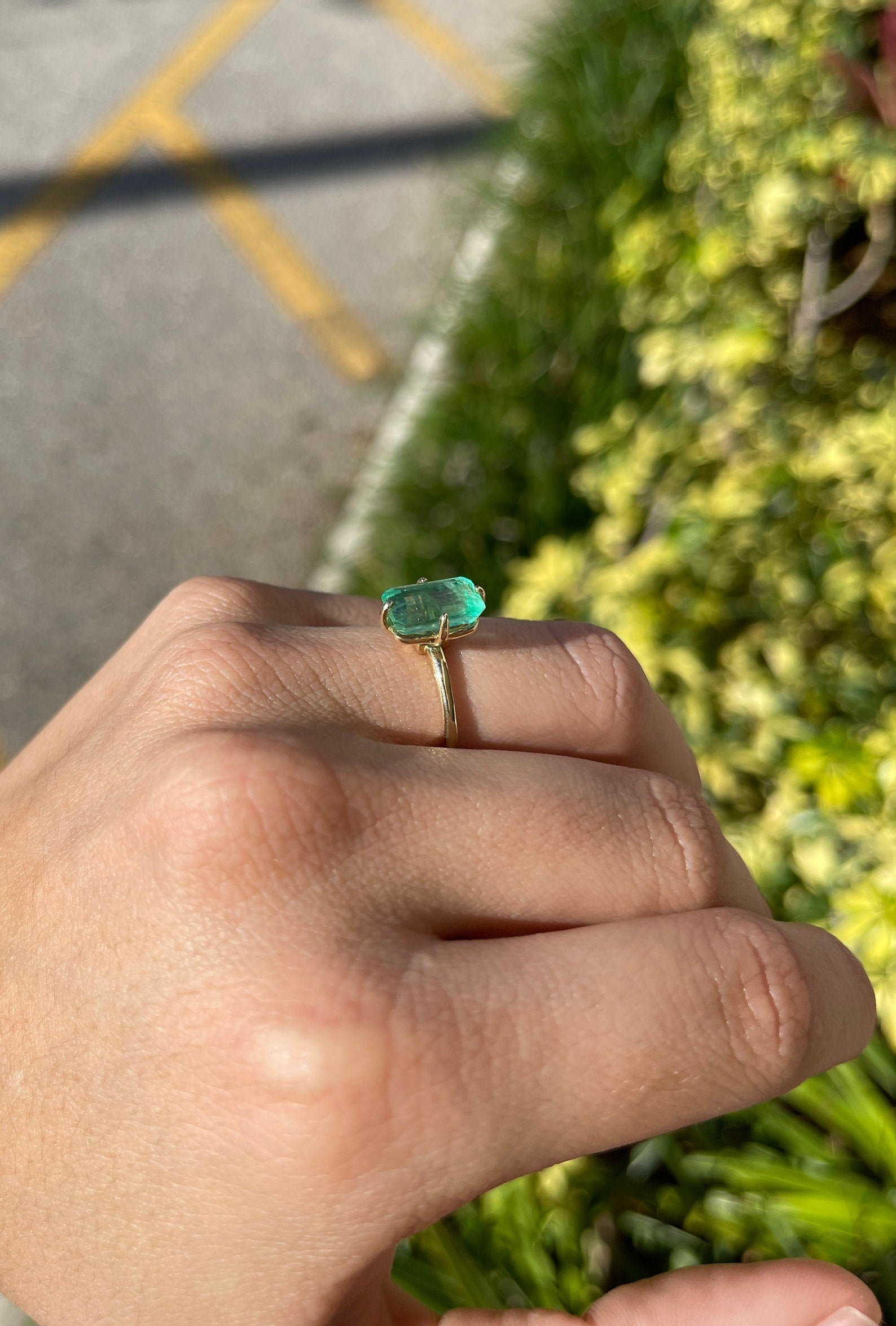 3.10 carat Colombian emerald solitaire engagement ring in 14K gold with a compass setting, showcasing a stunning emerald gemstone.