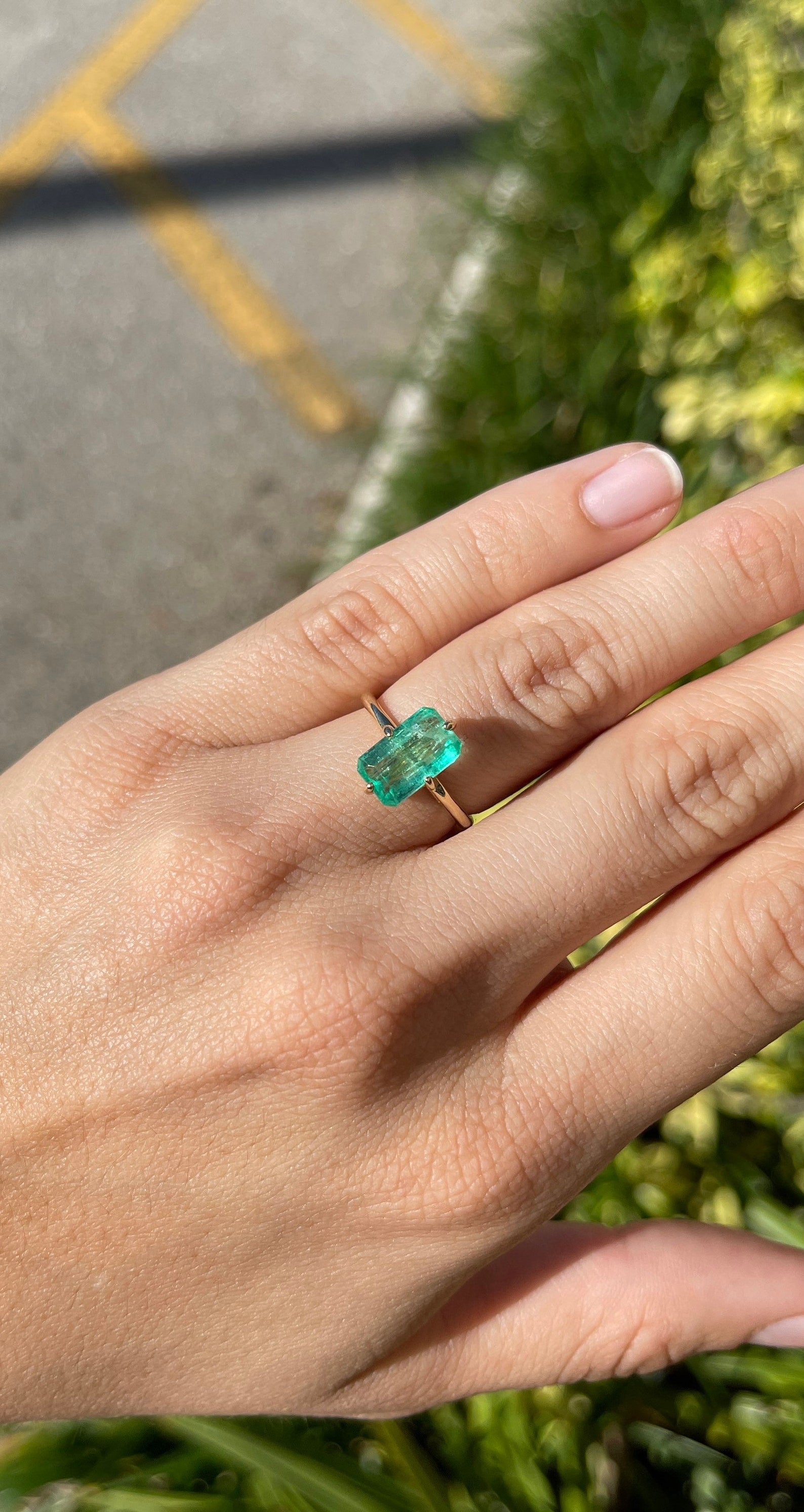 3.10 carat Colombian emerald solitaire engagement ring in 14K gold with compass design by JR Colombian Emeralds.