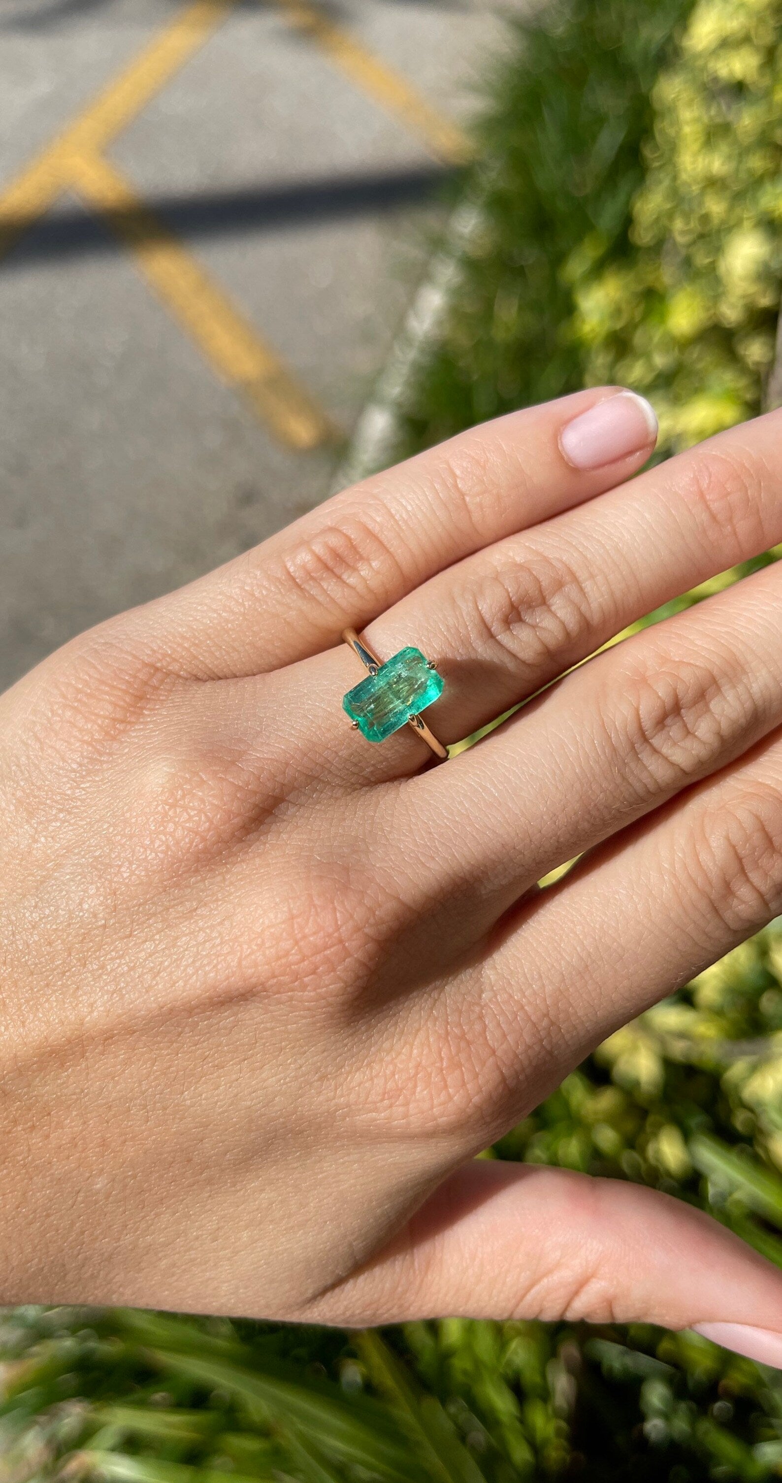 Colombian emerald solitaire engagement ring with 3.10 carats in 14K gold by JR Colombian Emeralds, showcasing a vivid green gemstone.