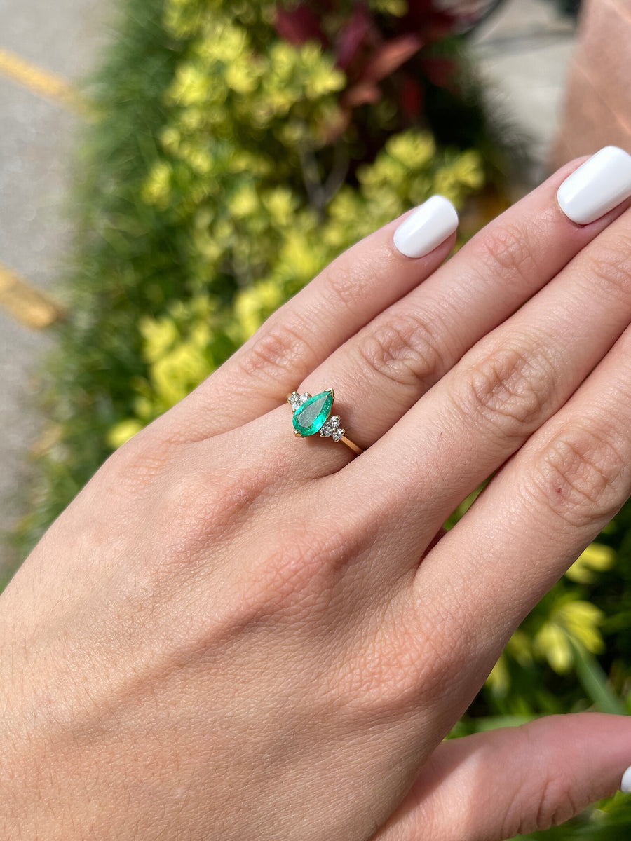 Chic and Sophisticated: Pear Shape V-Prong Accent 1.30tcw Emerald & Diamond Ring in 14K Gold