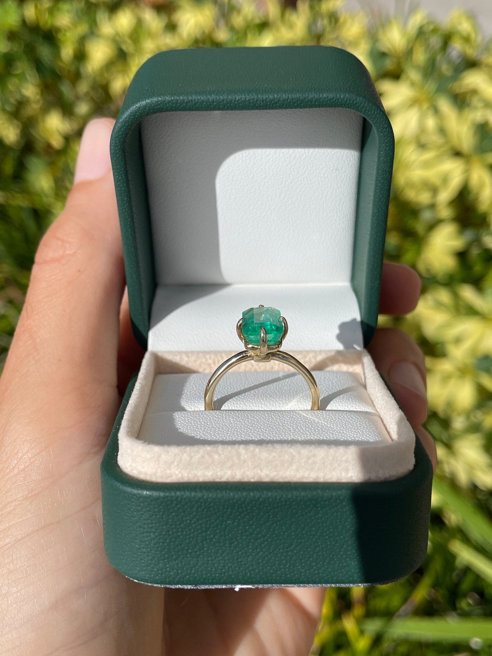 Colombian emerald solitaire engagement ring with 3.10 carat emerald in 14K gold setting, from JR Colombian Emeralds.