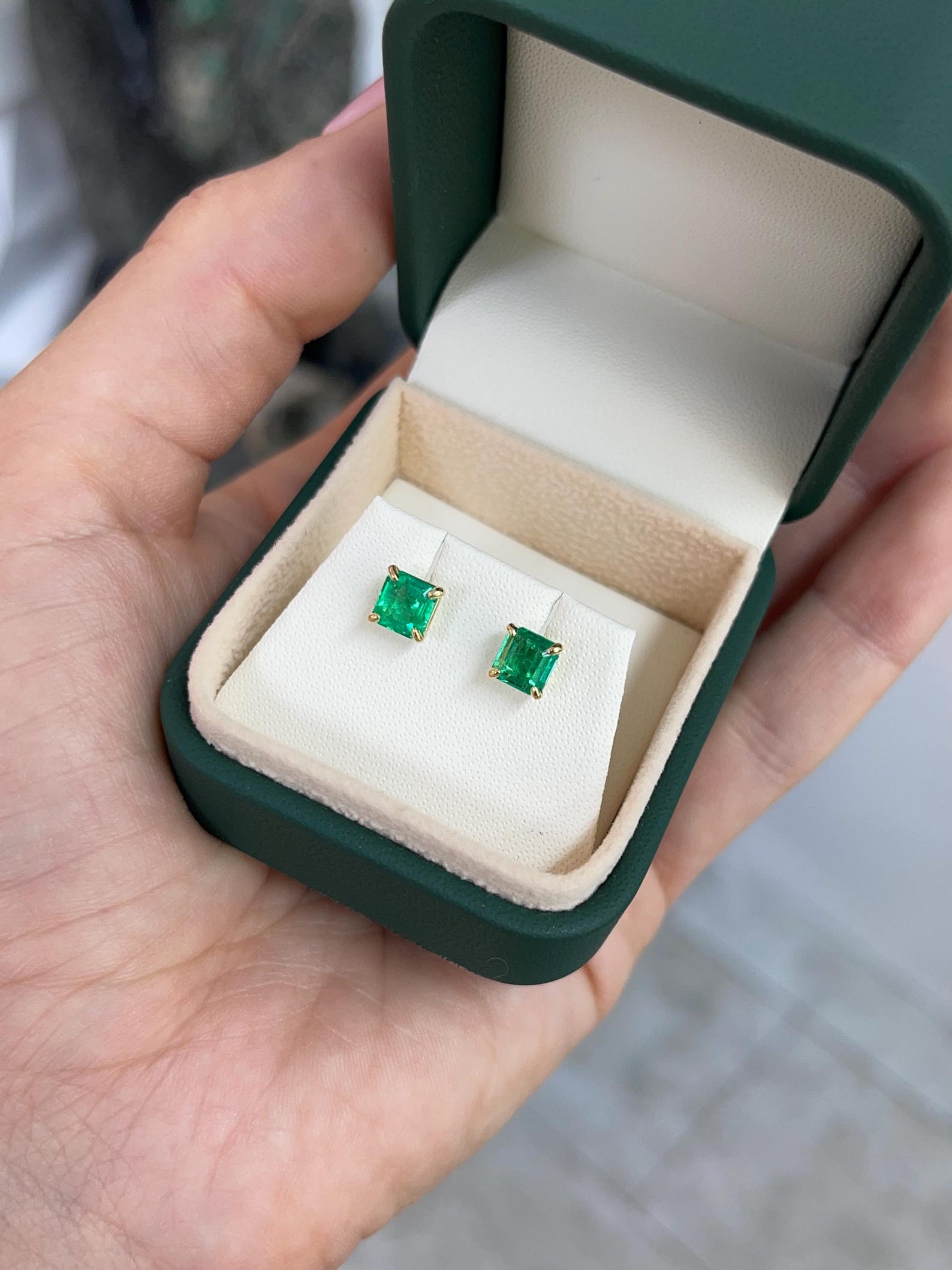 JR Colombian Emeralds 1.46tcw Muzo Green Asscher Cut Colombian Emerald stud earrings with four prongs.