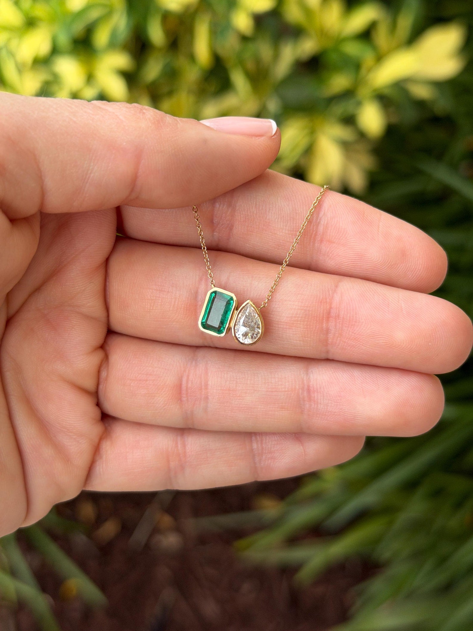 Emerald moissanite Toi Et Moi pendant necklace featuring two sparkling stones, crafted by JR Colombian Emeralds.