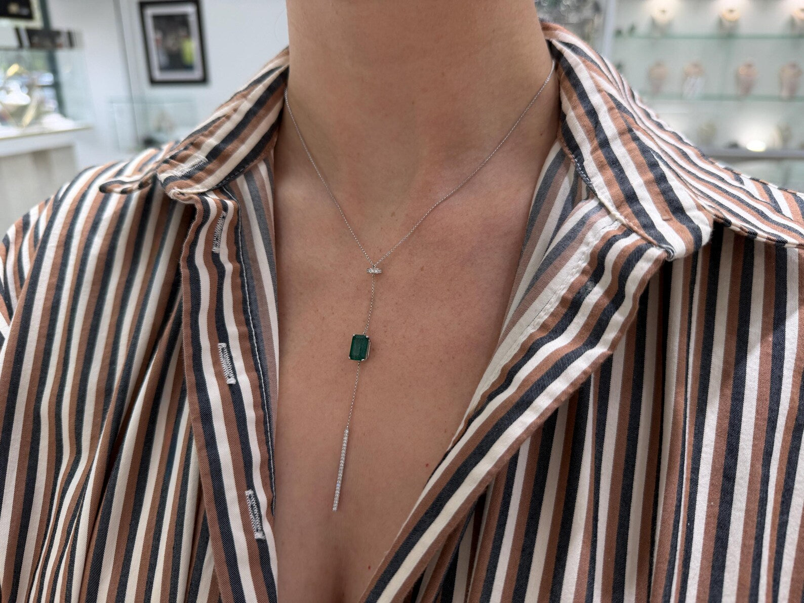 Natural emerald and diamond lariat necklace in 14K white gold, featuring a 3.25tcw pendant from JR Colombian Emeralds.