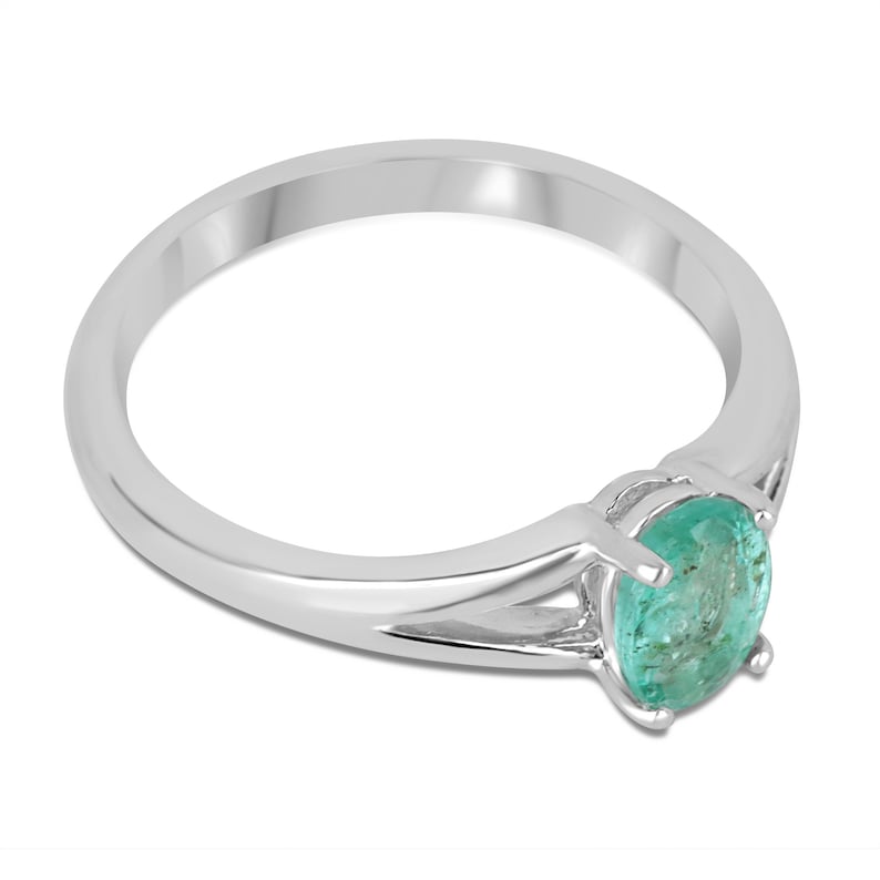 Sterling Silver Split Shank Solitaire Ring featuring a 0.70ct Natural Oval Cut Emerald in Light Spring Green