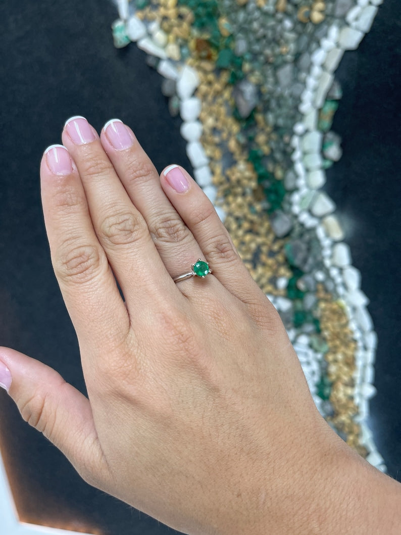 Celebrate Love: 14K White Gold Ring Featuring a 1.0ct Medium Dark Green Emerald Round Cut Solitaire
