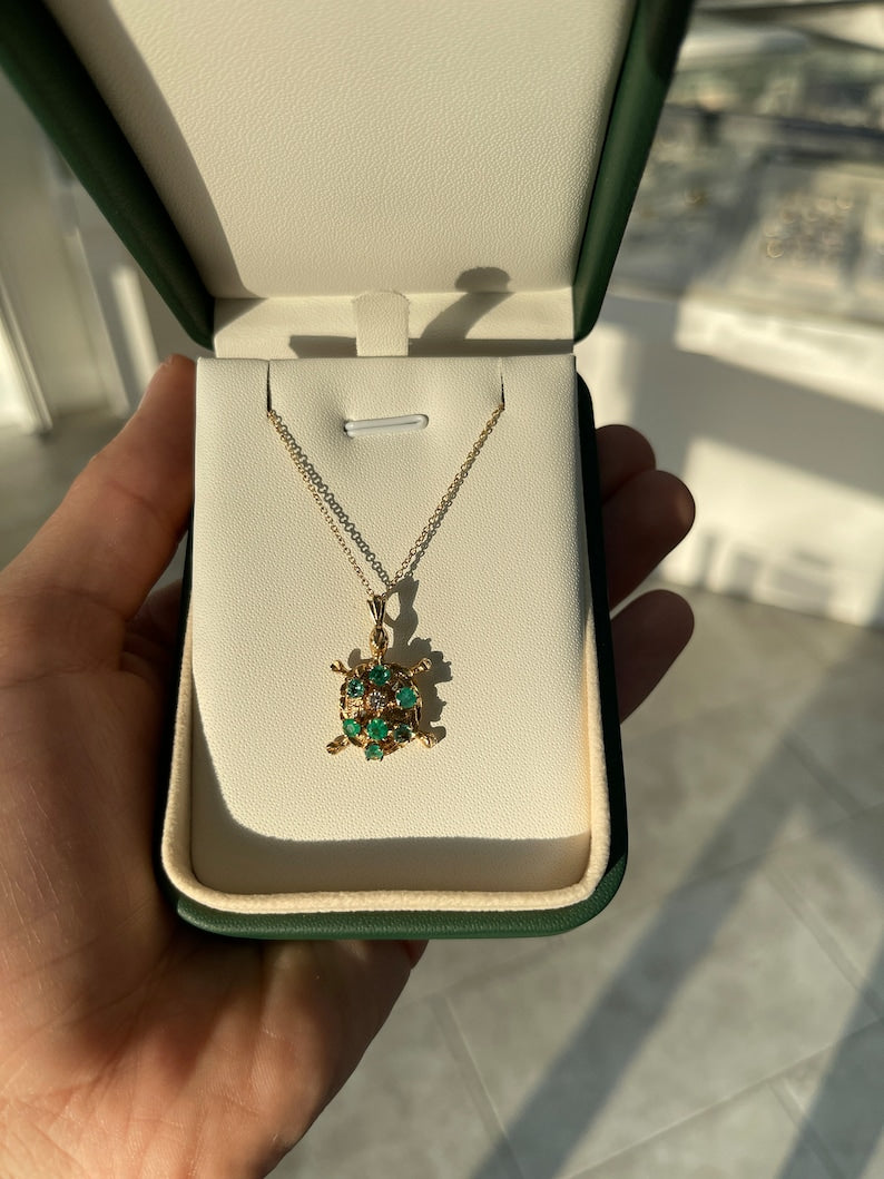 Natural Medium Green Emerald Sea Turtle Pendant on 14K Gold Necklace with Diamond Accent (0.64 Total Carat Weight)