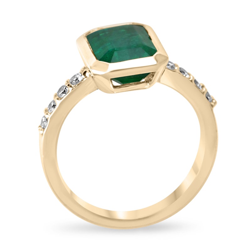 Green emerald cut engagement ring with diamond accents in 14K gold, featuring a 3.59 carat Colombian emerald.