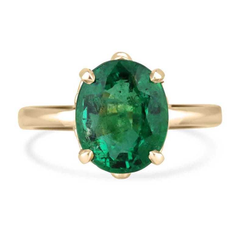 14K yellow gold ring with 3.93ct dark green oval emerald solitaire