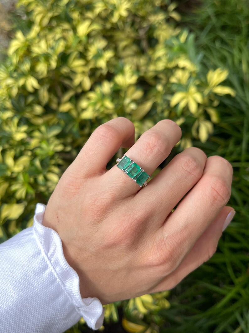 Elegant 14K White Gold Trilogy Ring Featuring 3.25tcw Medium Dark Green Emeralds