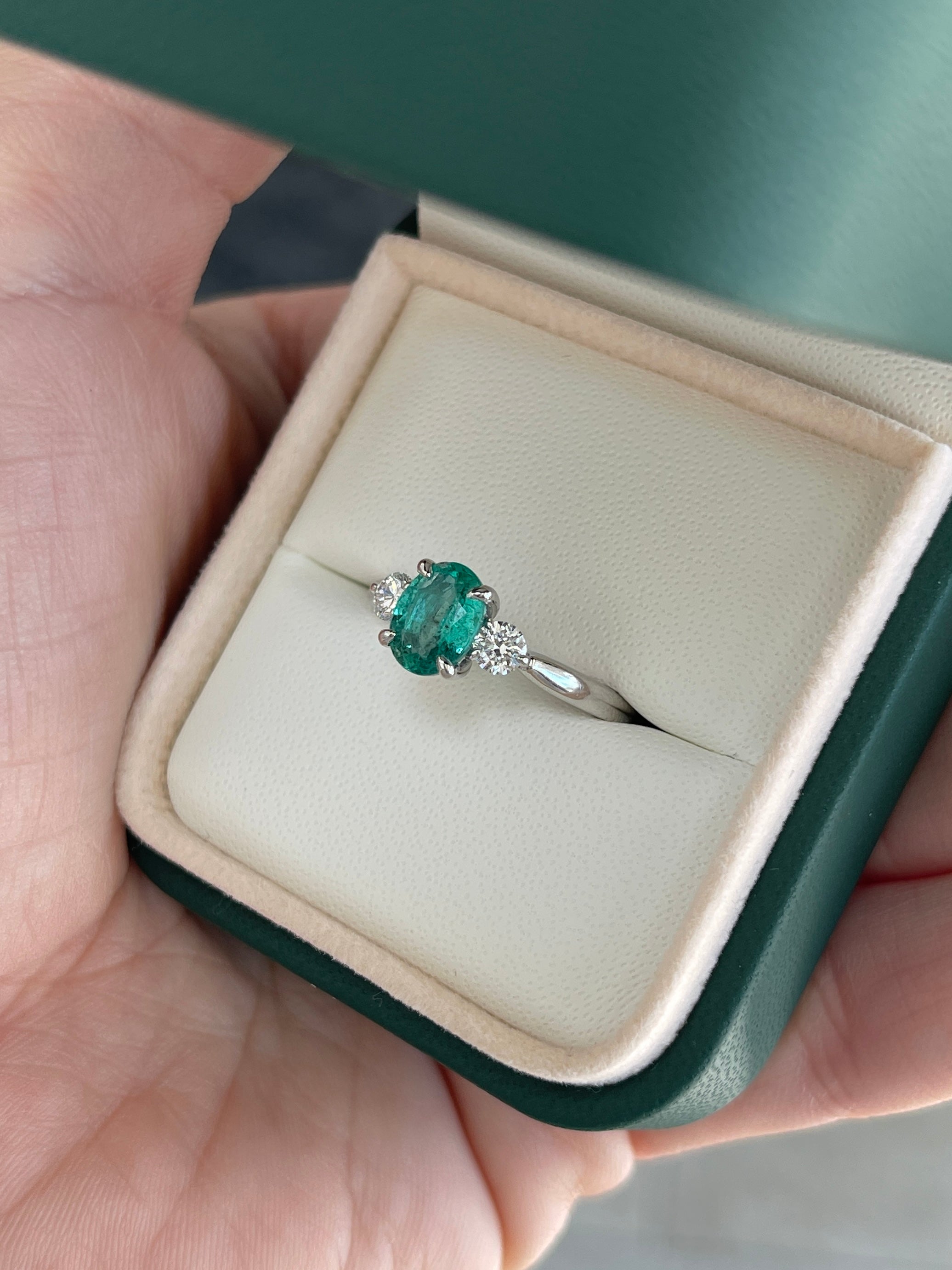 14K natural bluish-green oval cut emerald and round lab diamond three-stone ring by JR Colombian Emeralds, elegant jewelry piece.