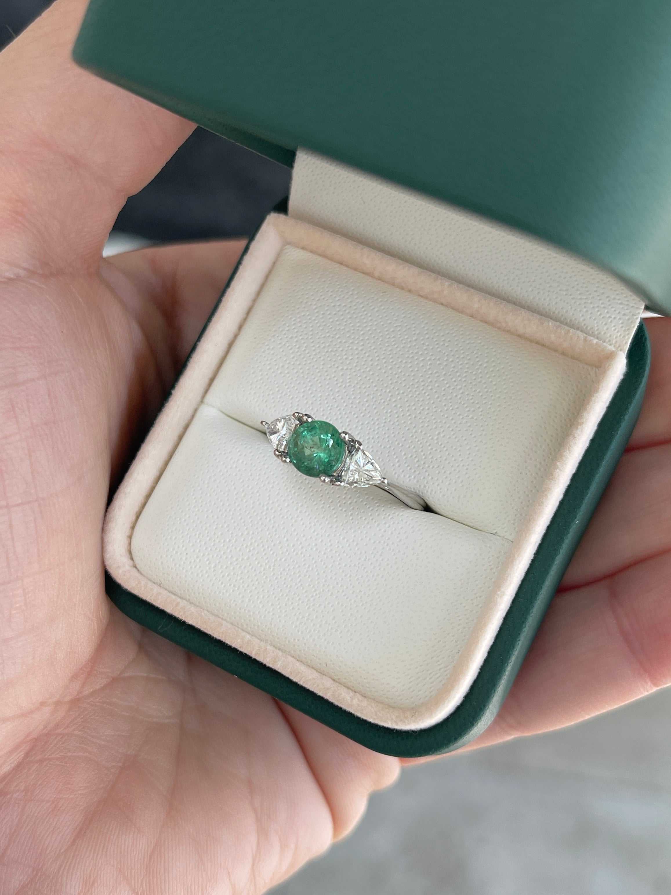 14K gold three-stone ring with 1.70tcw round cut emerald and lab diamond trillion accents, designed by JR Colombian Emeralds.