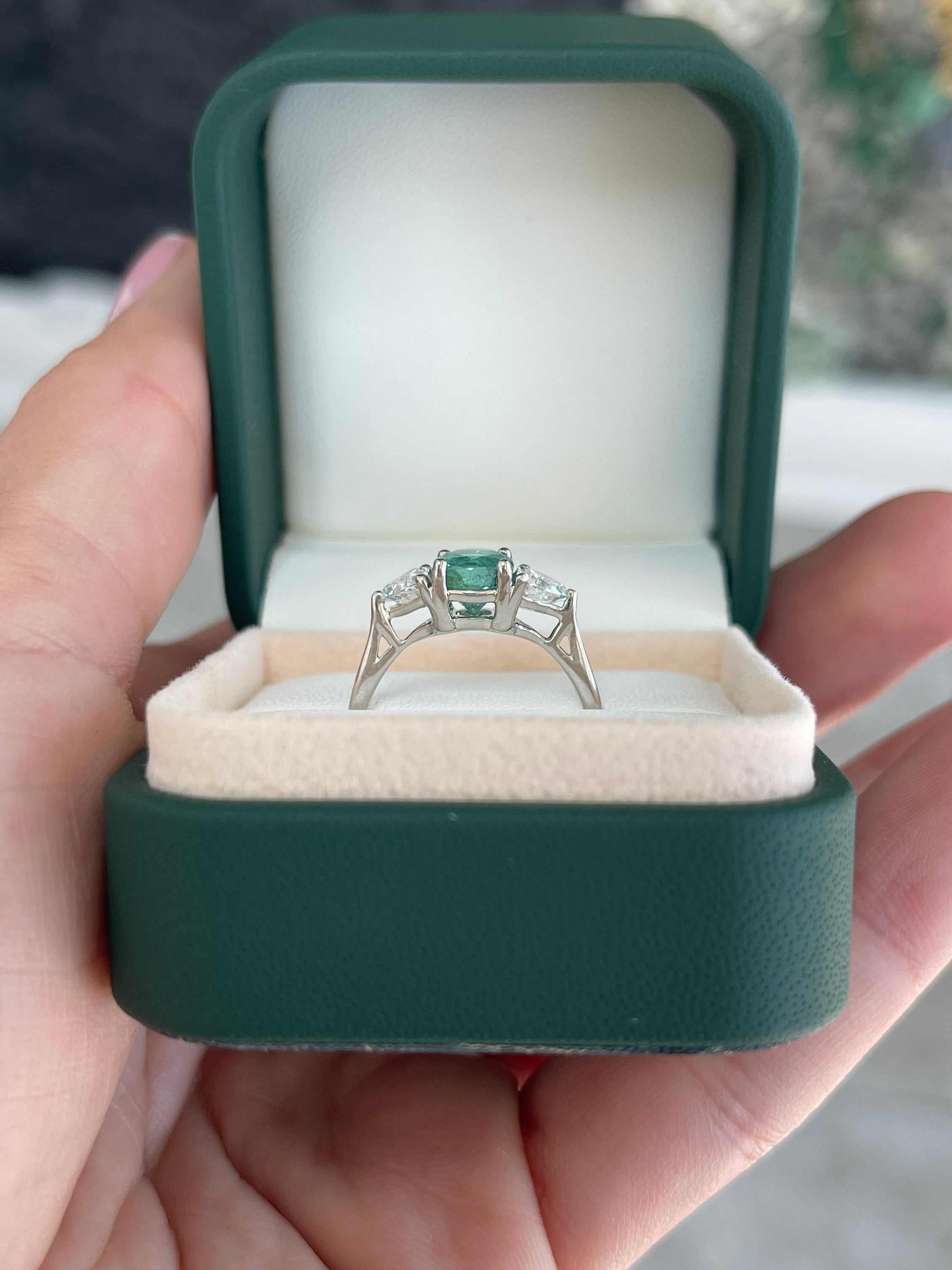 14K gold three-stone ring with 1.70tcw round cut emerald and lab diamond trillion accents, designed by JR Colombian Emeralds.