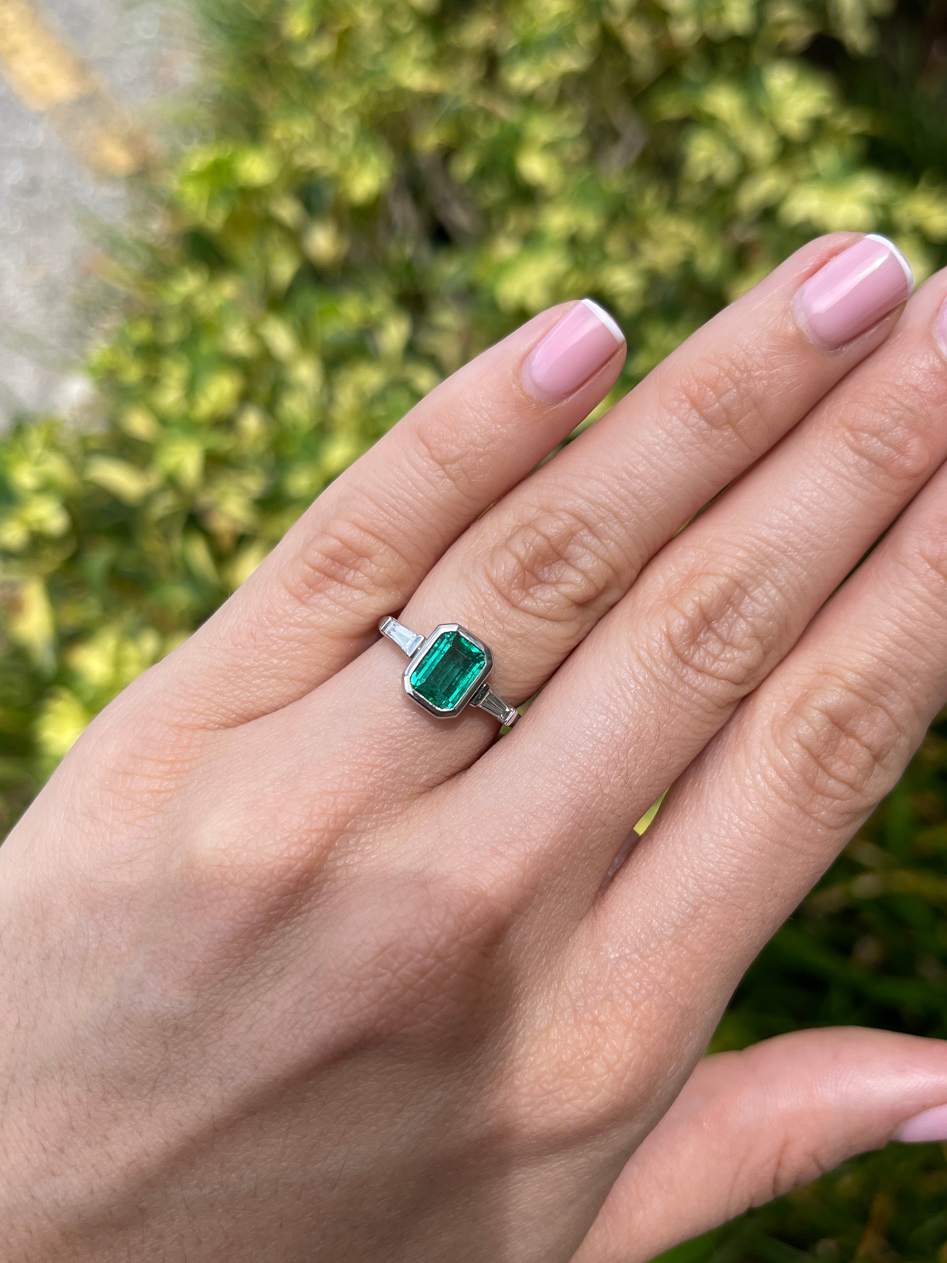 14K gold engagement ring with vivid emerald cut emerald and lab diamond baguette accents, three-stone design by JR Colombian Emeralds
