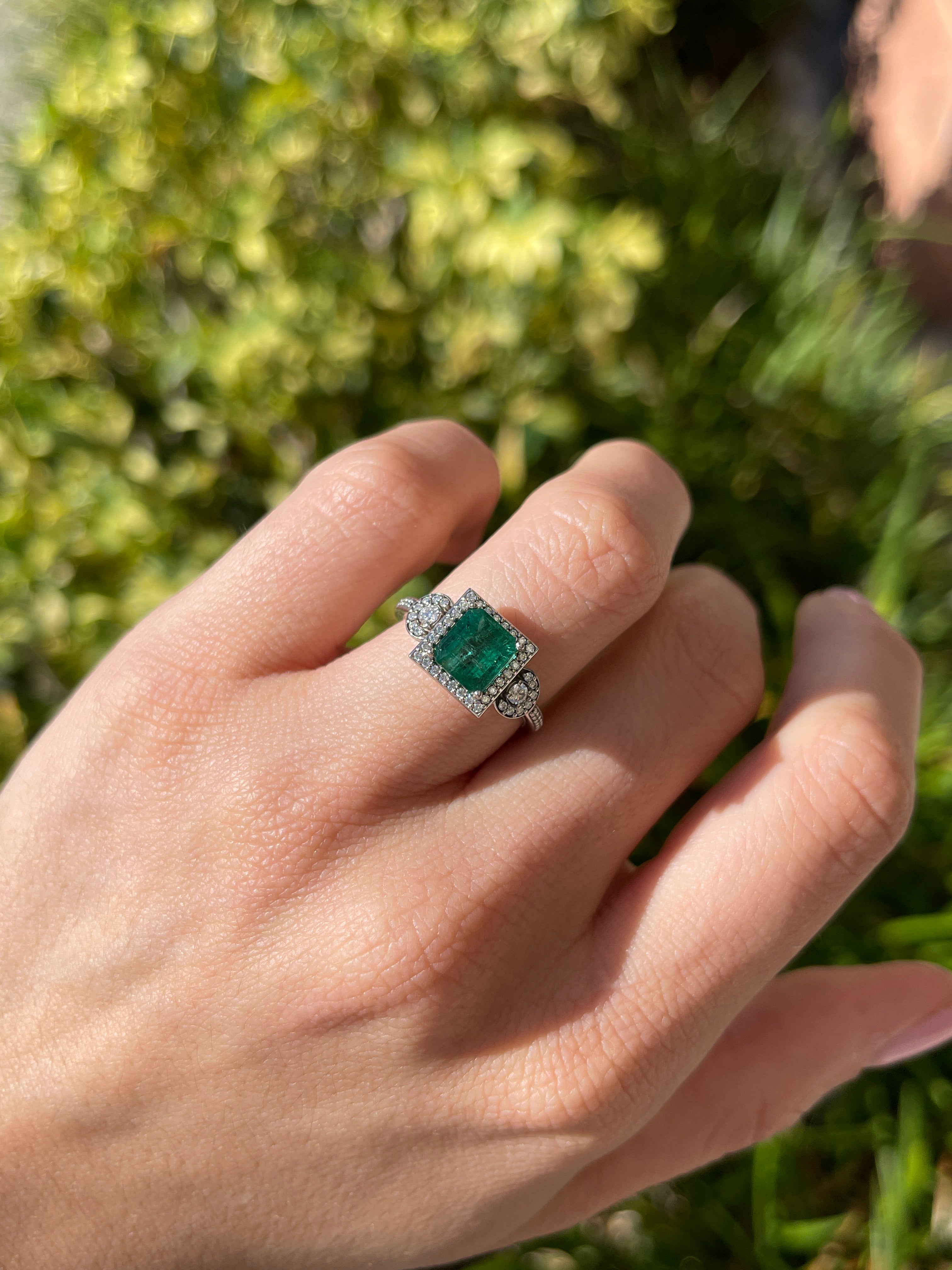 14K gold engagement ring with 2.20tcw rich green Asscher emerald and diamond halo accents, designed by JR Colombian Emeralds.
