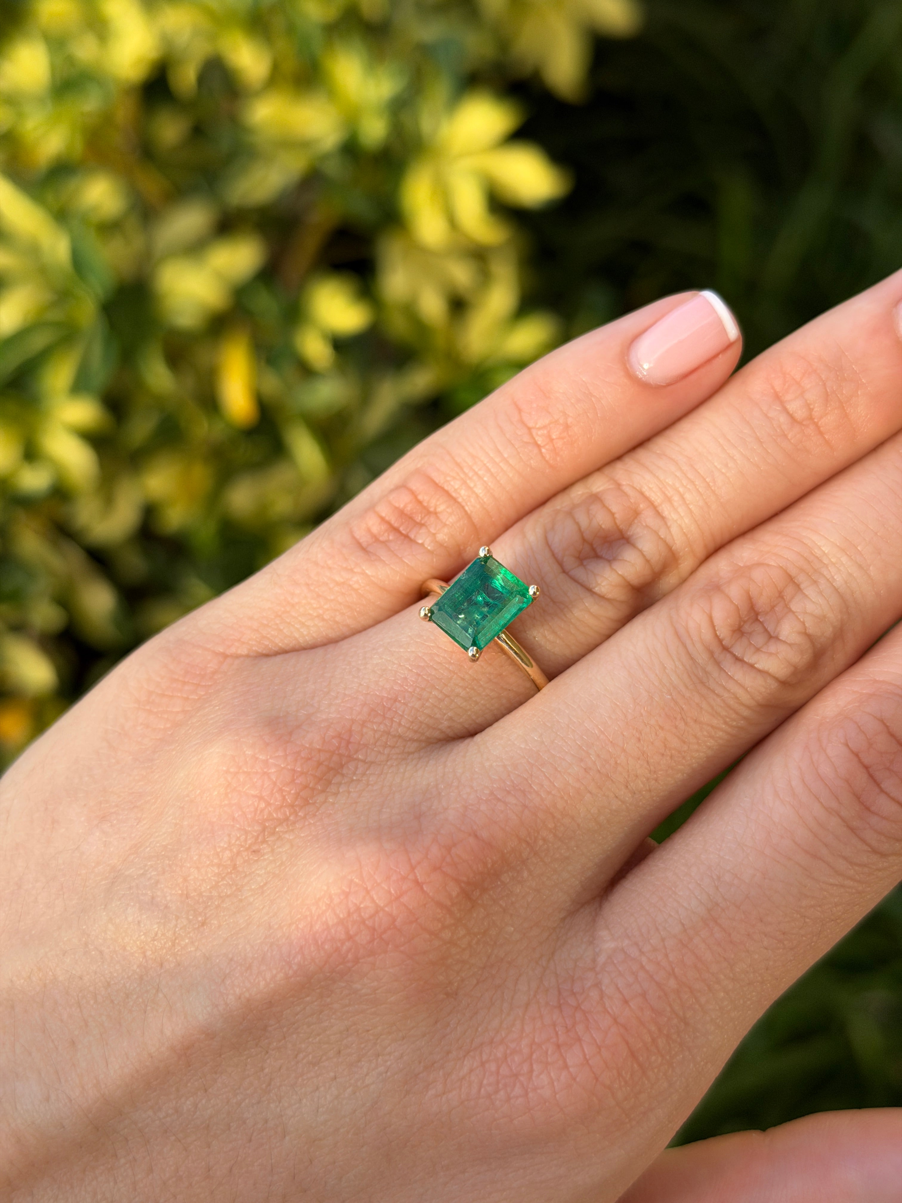 14K gold emerald solitaire ring featuring a 2.32-carat natural emerald in a classic four-prong setting by JR Colombian Emeralds