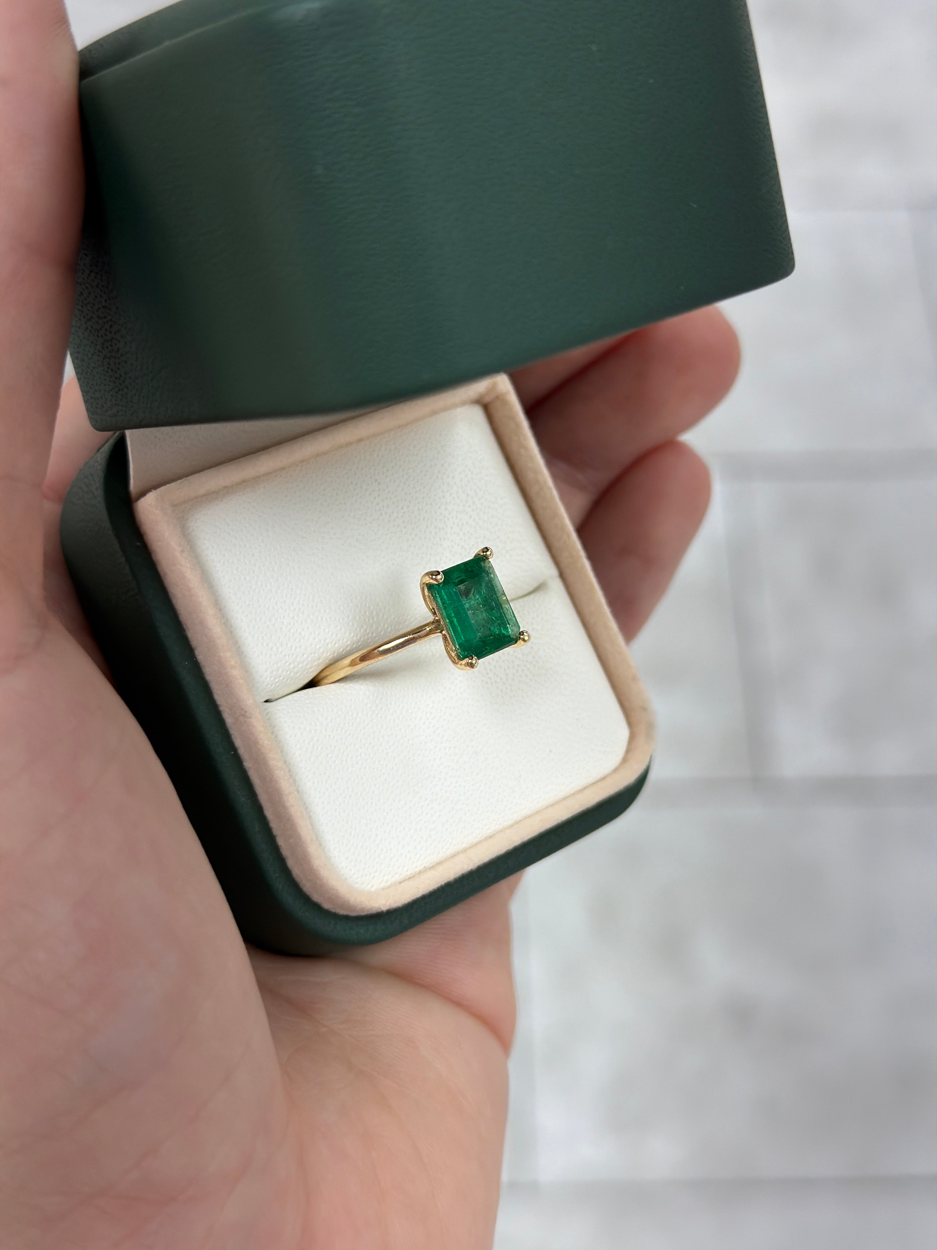 14K gold natural emerald solitaire ring with a 2.32 carat classic four-prong setting by JR Colombian Emeralds