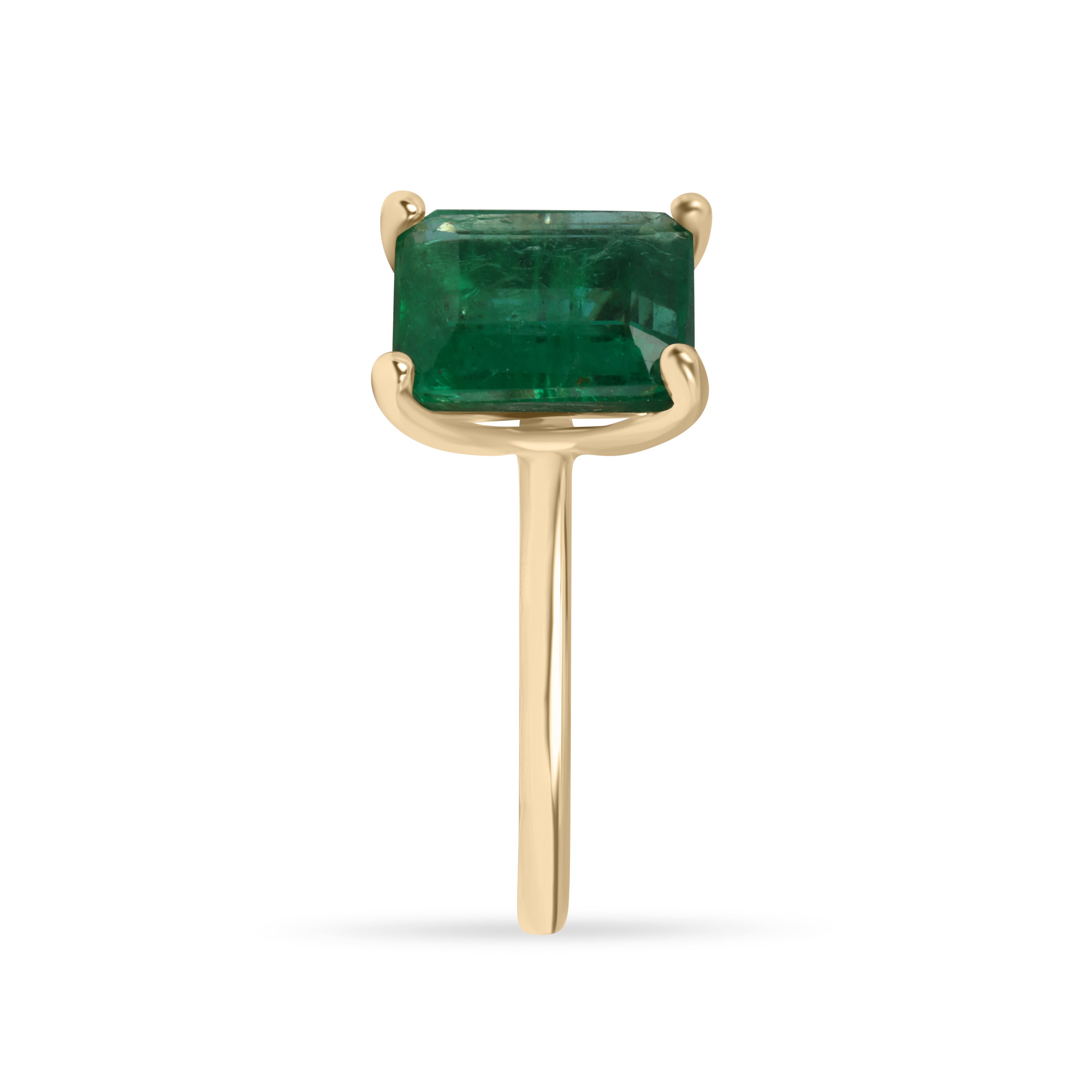 Natural emerald solitaire ring featuring a 2.32 carat emerald in a four-prong 14K setting by JR Colombian Emeralds.