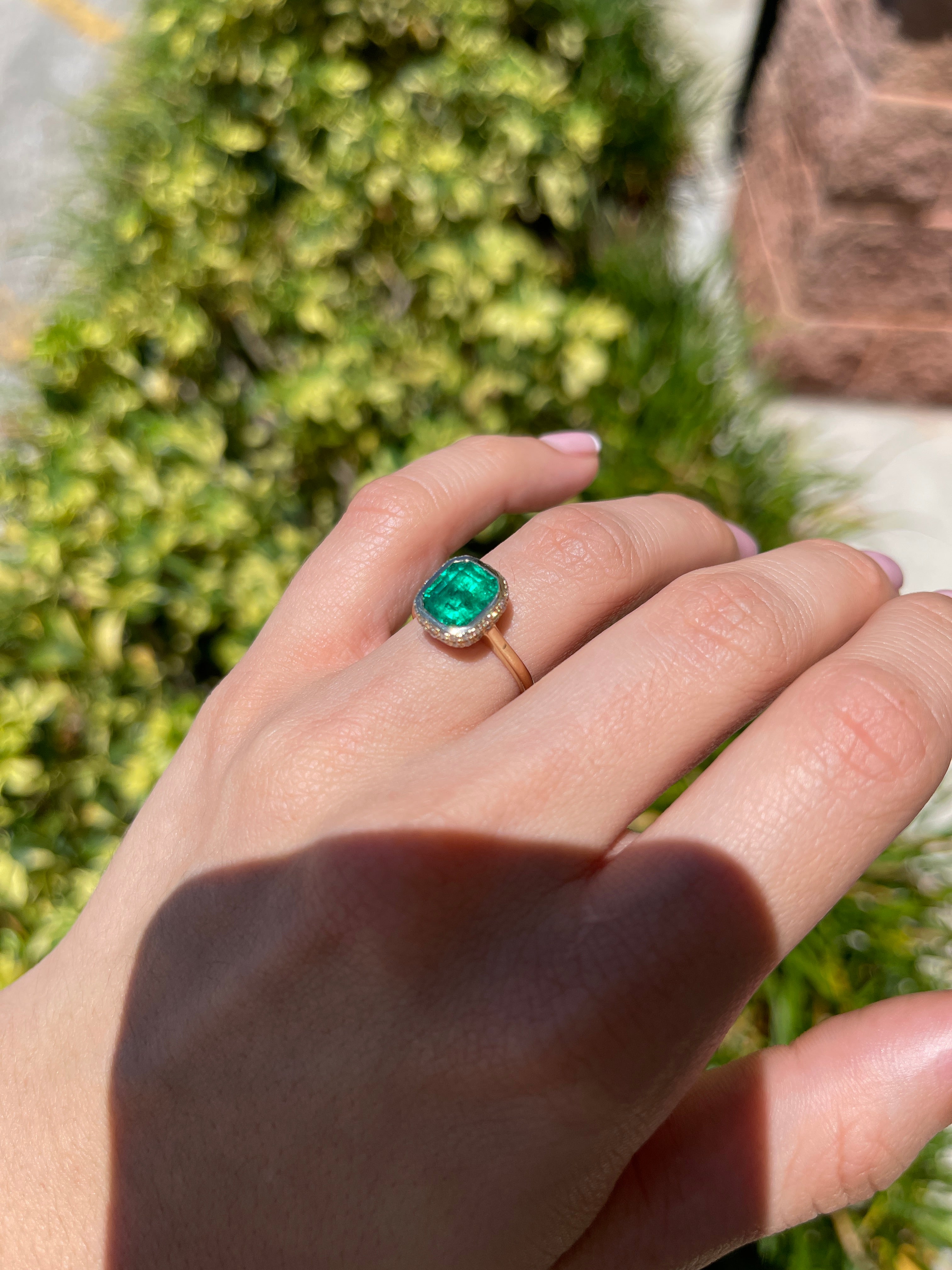 14K Colombian Emerald and diamond pave statement ring with bezel setting and hidden halo from JR Colombian Emeralds.